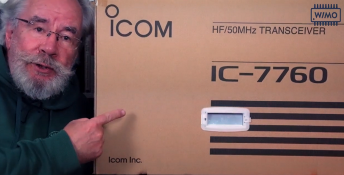 The carton bos of an Icom IC-7760 HF radio, with a hairy guy pointing to the box.